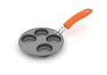 Round shaped mini pancake pan with orange handle for home cooking and kitchen use isolated on white background Royalty Free Stock Photo