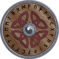 Round shield of the Viking is decorated with Scandinavian ornament and the runes