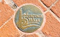 Round sidewalk medallion on Baltimore`s Heritage Walk