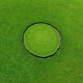 Round slice of grass field with soil piece of land with green grass surface isolated with Fresh environment and tourism Royalty Free Stock Photo