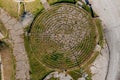 Round spiral labyrinth made of stones, top view from drone Royalty Free Stock Photo