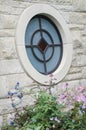 A round stained glass window at Ewing and Muriel Kauffman Memorial Garden Royalty Free Stock Photo