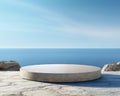 Round stone display table at ocean side is Futuristic.