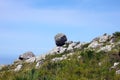 Round stone on the top of the mountain