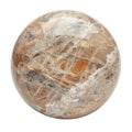 A round stone with a white and brown surface Royalty Free Stock Photo