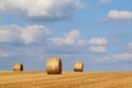 Round straw bales in a field