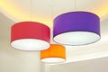 Round stylish lampshades hang from ceiling Royalty Free Stock Photo