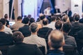 Round table discussion at business conference meeting event.. Audience at the conference hall. Business and Royalty Free Stock Photo