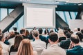 Round table discussion at business conference meeting event.. Audience at the conference hall. Business and Royalty Free Stock Photo