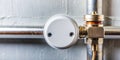 Round temperature sensor on the hot water pipe Generative By AI Royalty Free Stock Photo