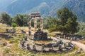 Round temple in the ruins of the ancient Greek city of Delphi (Delfi), Greece