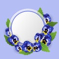 Round text frame with blue pansy flower and green leaf Royalty Free Stock Photo