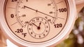 Round Thermometer Clock Showing Over 110 Degrees Royalty Free Stock Photo