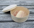 Round thin wooden box with lid