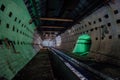 Round tiled tunnel in abandoned underground nuclear physics laboratory Royalty Free Stock Photo