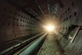 Round tiled tunnel in abandoned underground nuclear physics laboratory Royalty Free Stock Photo