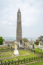 Round tower and cemetery in Ardmore village Royalty Free Stock Photo