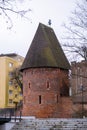 Round tower in the historic surrounding city wall of Slupsk, Poland. Witches tower - Baszta Czarownic. Sights of Poland