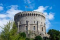 Round Tower with a raised flag in Windsor Castle, England Royalty Free Stock Photo