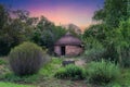Round traditional African village hut made of clay mud and straws in Bloemfontein Royalty Free Stock Photo