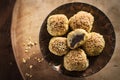 Round turkish dessert covered in sesame seeds Royalty Free Stock Photo
