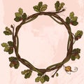 Round vintage frame of oak branches with leaves. Decorative element for design work in the boho style