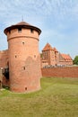 Round watchtower of the chivalrous castle of the Teutonic Order. Marlbork, Poland Royalty Free Stock Photo