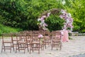 Round wedding arch with fresh flower decoration in pink and white