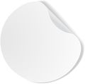 Round white blank sticker with a folded corner peeling upwards, creating a realistic and customizable template for Royalty Free Stock Photo