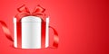 Round white gift box with red ribbon on the horizontal red background. Holiday gift vector banner. Royalty Free Stock Photo