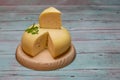 Round white homemade goat's milk cheese on wooden board Royalty Free Stock Photo