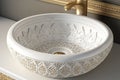round white wash basin with gold accents and intricate designs