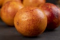 round whole red ripe group of oranges close-up