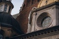 Round window, architectural details of Wawel Royal Castle, Krakow, Poland Royalty Free Stock Photo