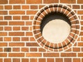 Round window in brick wall