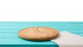 Round wood pizza cutting board and tablecloth on blue wooden table isolated on white background. Top view and copy space, Empty Royalty Free Stock Photo