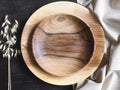 Round wooden craft plates mockup for eco, food or beauty product on black and textile backgrounds