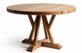 Round wooden dining table with unique cross base on white backdrop. Solid wood construction with visible grain. Ideal for home Royalty Free Stock Photo