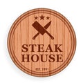 Round wooden plate, cutting board. Steak design elements template for logo label for steakhouse. Vector illustration. Royalty Free Stock Photo