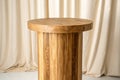 Round wooden podium for display on beige background Royalty Free Stock Photo