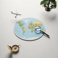Airplane is positioned above the map, while a golden compass lies to Royalty Free Stock Photo