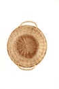 Round woven straw basket isolated on a white background Royalty Free Stock Photo