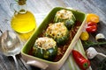 Round zucchini stuffed with meat and mozzarella