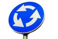 Roundabout crossroad road traffic sign on white