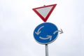 Roundabout traffic sign - Change of direction - Alternative way out Royalty Free Stock Photo