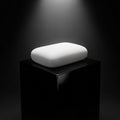Rounded edges is positioned on a glossy black pedestal under a focused Royalty Free Stock Photo