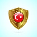 Rounded flag of Turkey with glossy gold shield Royalty Free Stock Photo