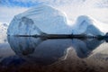 Rounded iceberg with perfect reflection Royalty Free Stock Photo