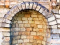 Rounded old brickwork. Fragment of brickwork in the monastery