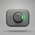 Rounded rectangular black switch with a central protruding knob. A green LED Royalty Free Stock Photo